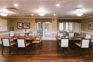 A warm and welcoming dining space features comfortable seating, thoughtfully arranged tables, and abundant natural light. Designed to encourage connection and community, this inviting setting provides residents with a pleasant environment to enjoy meals, activities, and meaningful social engagement.